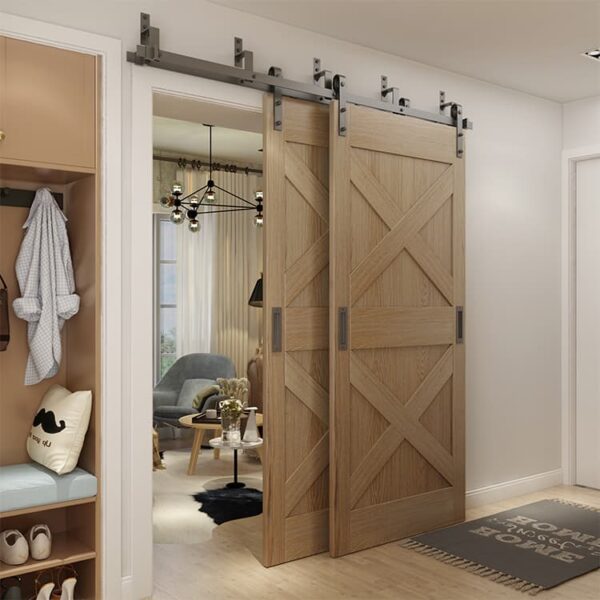 A modern interior featuring a Wall Mount Barn Door Bypass Bracket, with the sliding door open to reveal a cozy living room adorned with stylish decor and furniture.