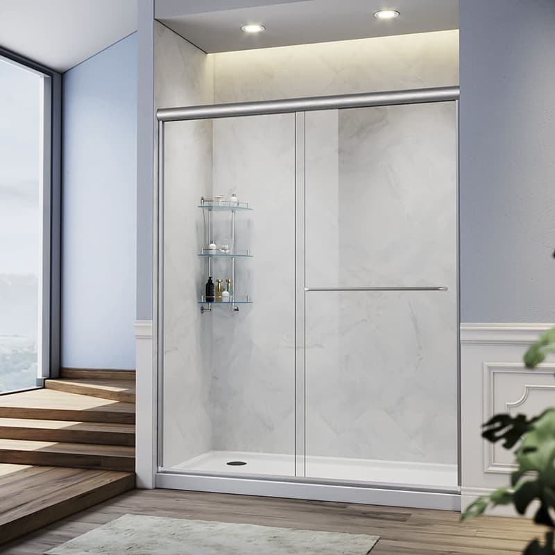 A modern bathroom featuring a glass-enclosed shower with white marble walls, adjacent to a wooden staircase and overlooking a scenic view.