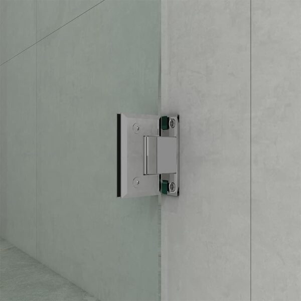 A modern Glass Hinge Shower Door with Fixed Glass mounted on a gray marble wall.