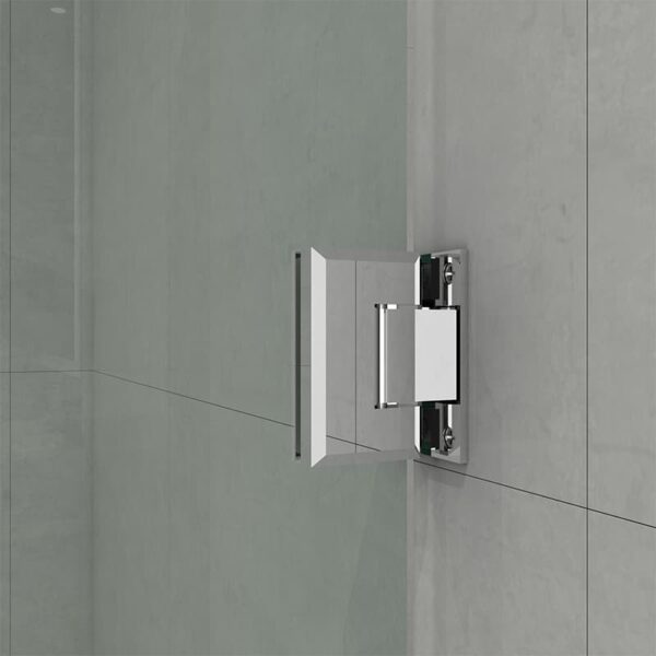 Wall-mounted chrome faucet with a single handle, extending from a light gray tiled wall beside a glass Hinged Shower Door.