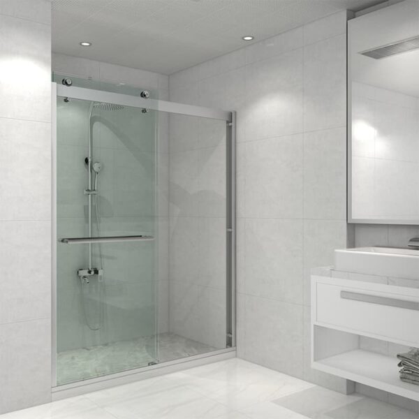 Modern bathroom with a tempered glass shower door, white vanity unit, and gray tiled walls and floor.