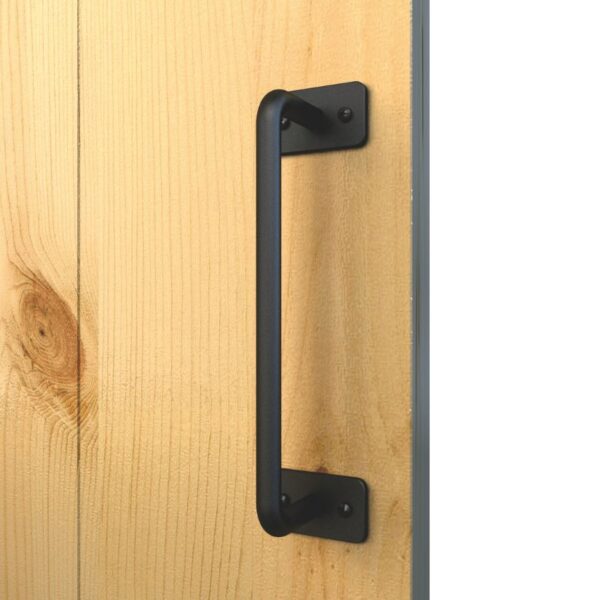 A wooden door with a sleek, modern black barn door grip, perfect for interior use.