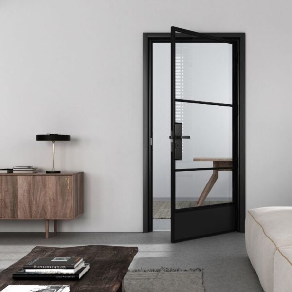 A black steel frame glass barn door with an optional lock complements gray walls in a modern living room, featuring a lamp-topped sideboard.