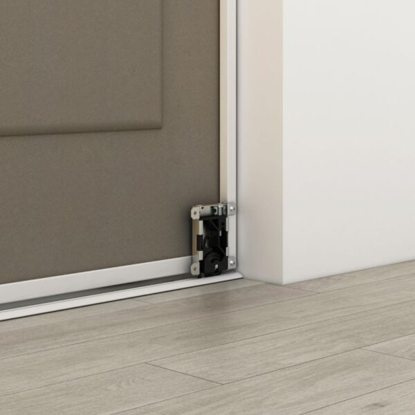 Close-up of the Customizable One Panel Closet Door mechanism on a brown door with a sturdy steel and MDF build, installed on a wooden floor.