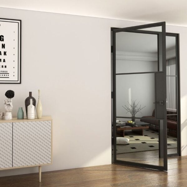 Modern space with open steel and glass door, patterned sideboard, decor items, and framed art on the living room wall.