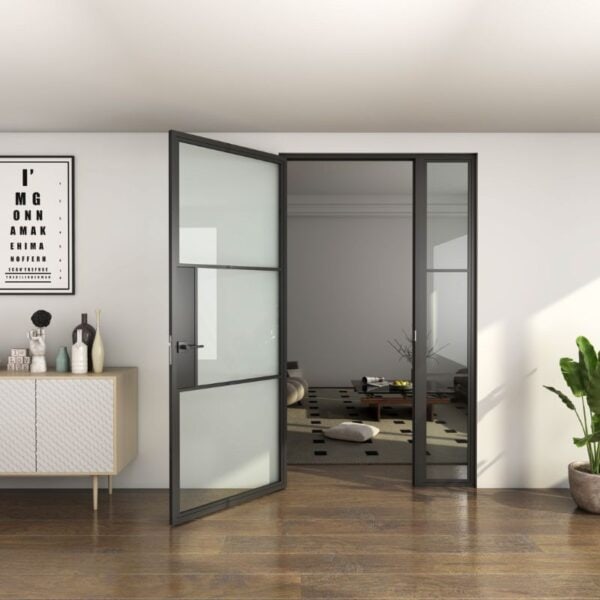 Modern living room with steel & glass door system, sideboard, framed print, potted plant, and wood flooring.