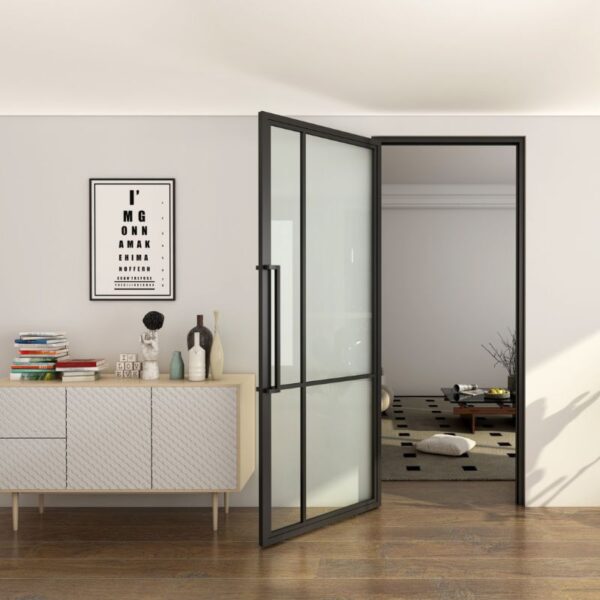 Modern room with a black steel French door, white sideboard, eye chart, and a view into another room with cushions.
