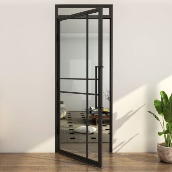 Steel & glass door with fanlight open to a modern living room with a rug, coffee table, and green potted plant nearby.