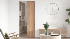 Sleek modern living room with minimalist furniture and natural wood accents, featuring a stylish wall clock and lush indoor plant, perfect for contemporary home decor and interior design.