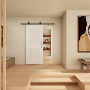 Elegant 36x84 arch barn door with two panels, perfect for stylish interior room separation. Features durable construction and smooth sliding mechanism for modern farmhouse decor.