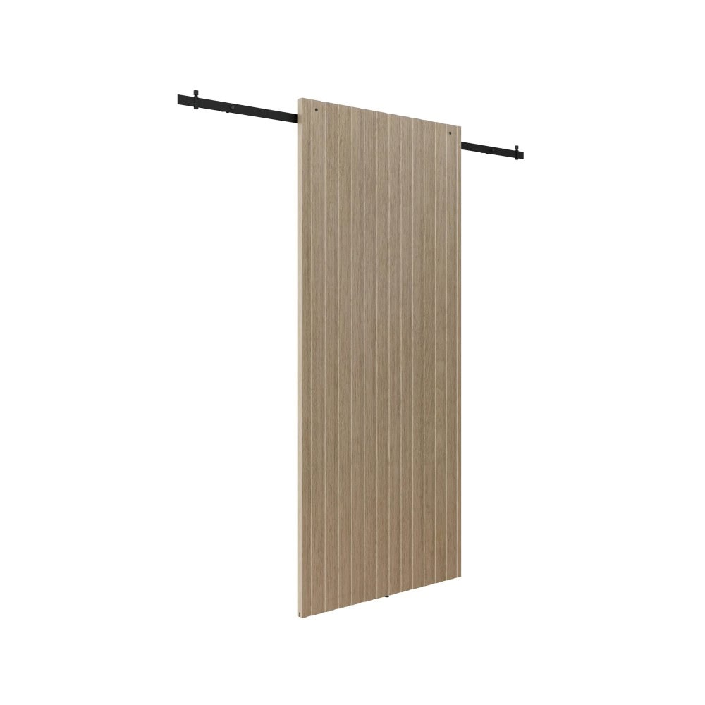 Concealed sliding barn door hardware system with a beige wooden door and black metal track for space-saving interior design.