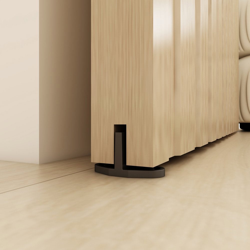 Close-up of a modern wooden cabinet with a black base, showcasing sleek design and smooth finish, ideal for contemporary interior decor.