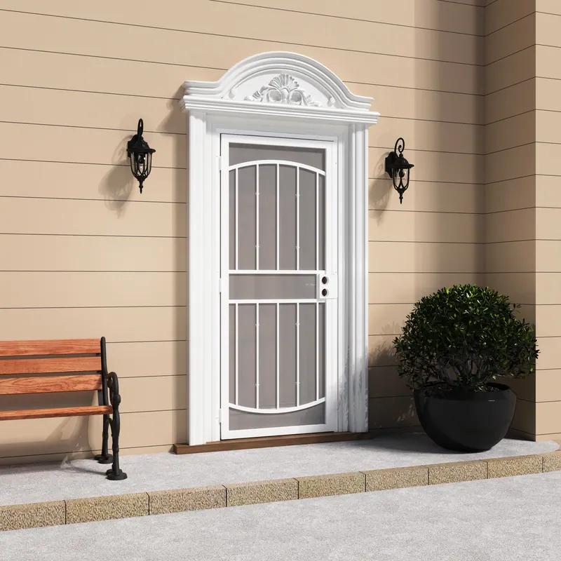 White surface mount steel security door with expanded metal screen, decorative arch top, and side panels, installed on a beige exterior wall.