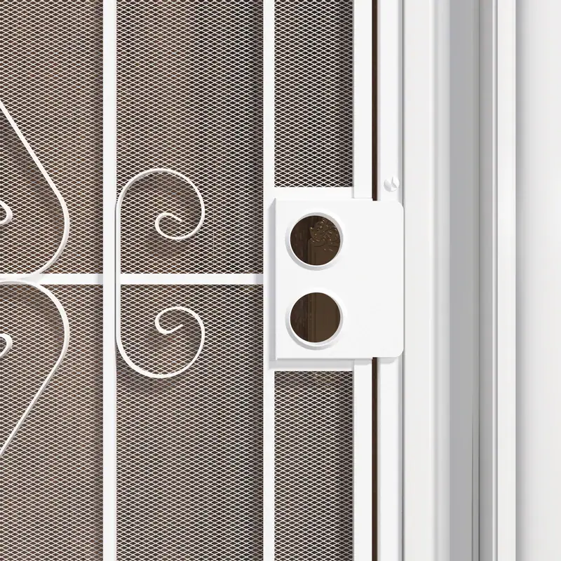 Close-up of a white security screen door with decorative scrollwork and expanded metal mesh, designed for enhanced security and aesthetic appeal.